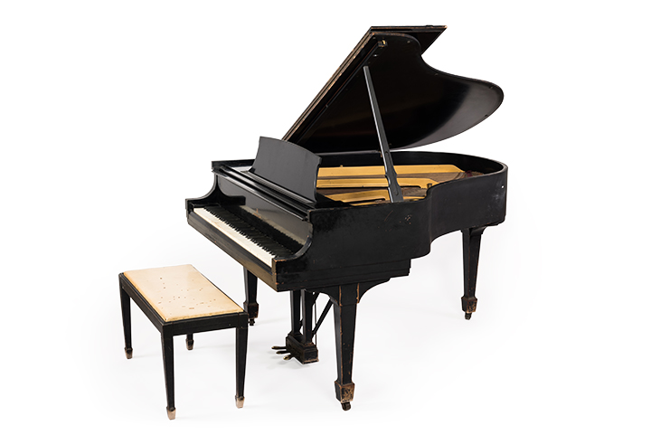 The “Pannonica Piano” bears evidence of significant use, including cigarette burns on its bench. Gift of the Robert J. Ulrich and Diane Sillik Fund